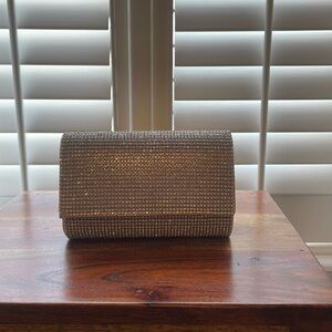 Crystal embellished clutch, can be worn with or without strap (included).